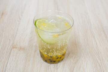 italian flavored sodas with ice and tropical flavors on white wooden background