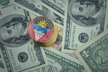 golden shining bitcoins with flag of antigua and barbuda on a dollar money background.