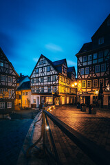 Wetzlar in Hessen Germany. Beautiful half-timbered houses at night, taken at the blue hour. Beautiful historic German residential buildings
