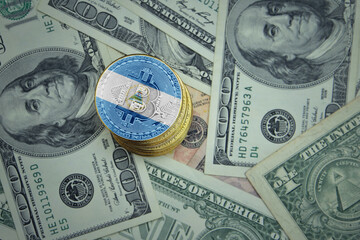 golden shining bitcoins with flag of nicaragua on a dollar money background.