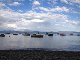 Landscape of boats on Lake Tahoe at dusk 