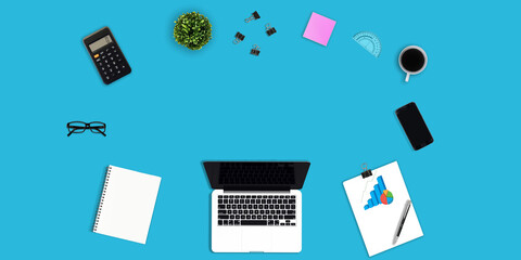 Top view work space equipment at color background with copy space. notebook tablet pencil paper rolled and coffee cup. pastel two tone. hipster. time to work concept