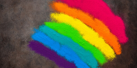 Colorful rainbow holi color powder. Holi festival. Beautiful festive background.