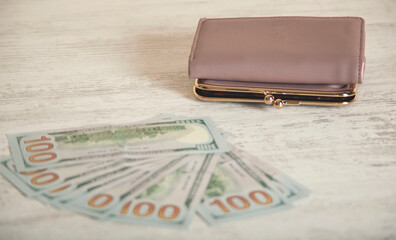 wallet with money on desk