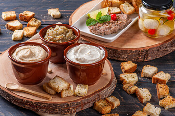 .Meze is an oriental set of appetizers served in small bowls with babaganush, curd, hummus and kibbeh
