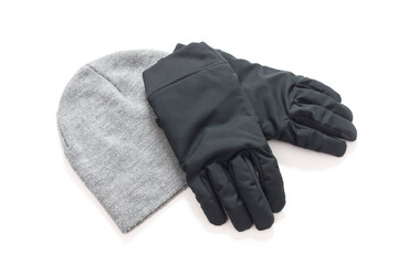 Grey knitted mens hat and gloves isolated on a white background. 