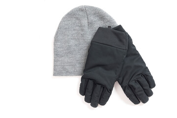 Grey knitted mens hat and gloves isolated on a white background. 