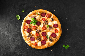 Pepperoni pizza with mushrooms and mozzarella