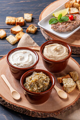 .Meze is an oriental set of appetizers served in small bowls with babaganush, curd, hummus and kibbeh