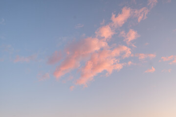 Beautiful sky with sunset pink violet clouds