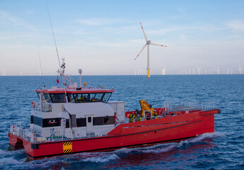 Crew transfer vessel about to start working in wind farm