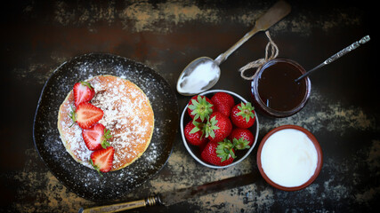 Victoria sponge cake with strawberries and white cream. Delicious famous dessert.