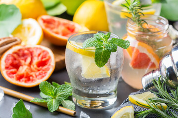 Hard seltzer cocktails with citrus fruits, zero waste bartenders accessories