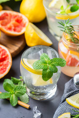 Hard seltzer cocktails with citrus fruits, zero waste bartenders accessories