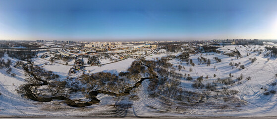 Fototapeta premium Winter urban landscape. Aerial photography of the winter landscape. Panoramic photography.