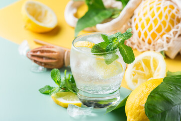 Hard seltzer cocktail with lemon and zero waste bartenders accessories
