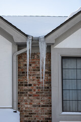 Ice Sickle Damming on Roof