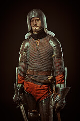 tired hero in his armor