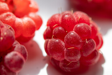 Close-up. Red sweet fresh raspberry berries close-up. . Macro photo.