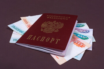 russian passport with Russian currency