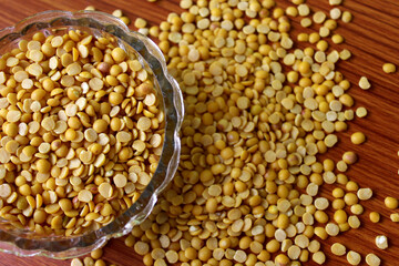 split pigeon peas ( Arhar Dal ) Organic Toor Dal in Bowl, Selective Focus with Blur Background