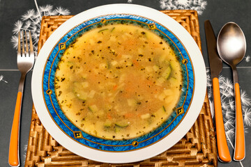 hot vegetable soup on dish ready to eat. winter menu