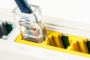 Router ethernet port with connected patch cord cable macro