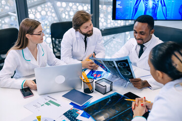 international team of professional doctors having a meeting in c