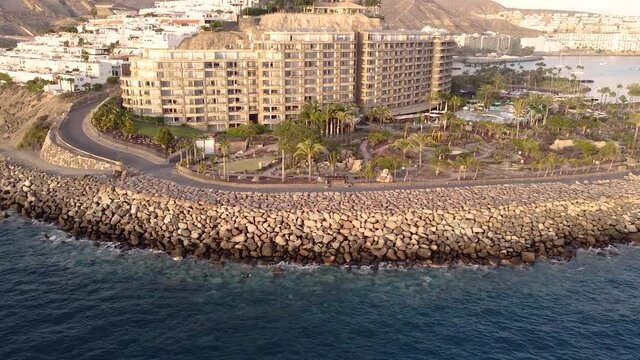 aerial view of the coast of Gran Canaria, resorts, hotels and holiday houses on the beach. Arguineguin.