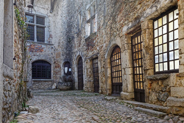Fototapeta na wymiar PEROUGES, FRANCE, February 23, 2021 : Perouges prince's house. The town was restored and houses were saved in the beginning of 20th century and is now a popular tourist attraction.