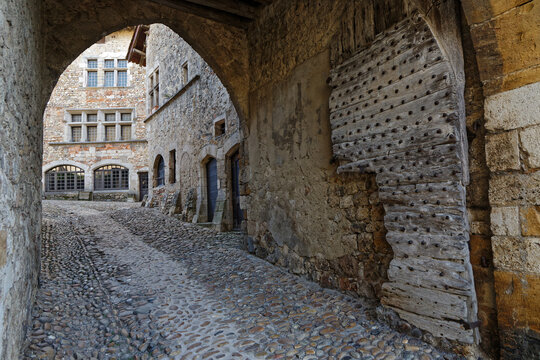 PEROUGES, FRANCE, February 23, 2021 : High entrance of the old city. The town was restored and houses were saved in the beginning of 20th century and is now a popular tourist attraction.