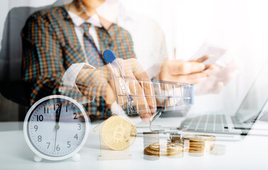 businesswoman holding coins putting in glass with using smartphone and calculator to calculate concept saving money for finance accounting