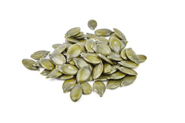 Pumpkin seeds isolated on a white background. Heap of dry pumpkin seeds