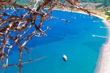 View from the mountain to the sea lagoon, beach, tourist ships, summer vacation concept