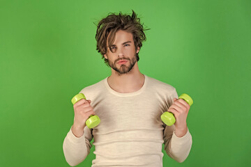 Morning sportsman isolated on green. Energy and sport success. Funny man workout after wake up,...