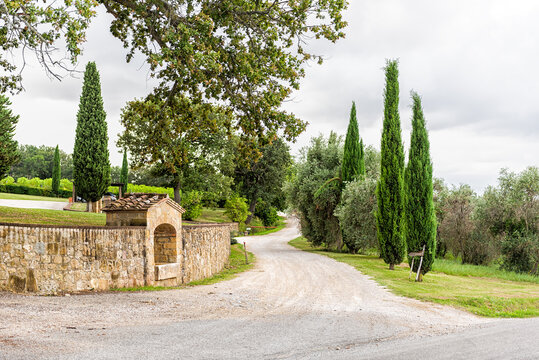 Monticchiello, Italy Val D'Orcia countryside in Tuscany with empty street dirt road in small town village with nobody