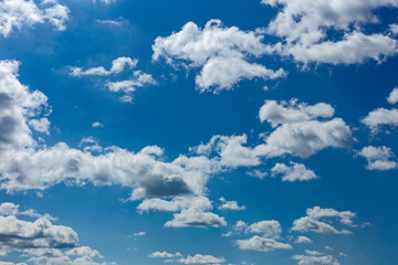 Beautiful blue sky with white clouds as a natural background.