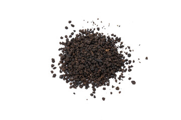 black tea granules isolated on white background. design element. indian beverage tea cut out