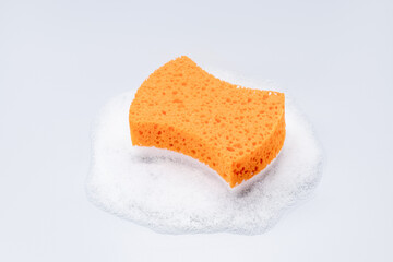 bath sponge with gel foam isolated on gray background. spa skin care concept