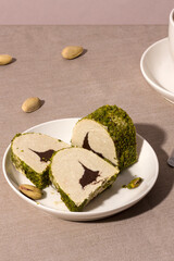 Eastern sweet chocolate halva with pistachios on a table