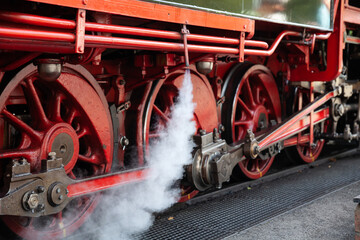 Red steam railway wheels