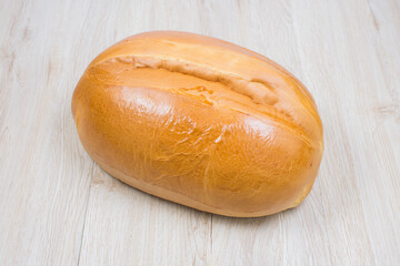 Fresh bakery on light wooden background