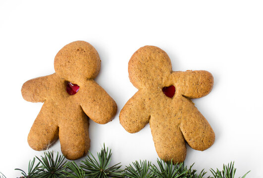 A pair of gingerbread lovers isolated on a white background. Christmas cookies with love. Place for text