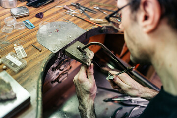 Man Making Handmade Jewelry