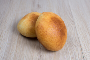 Fresh bakery on light wooden background