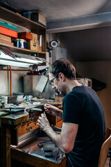 Man Making Handmade Jewelry