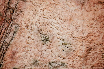 A fragment of a bare solid wall made of concrete material (textured)
