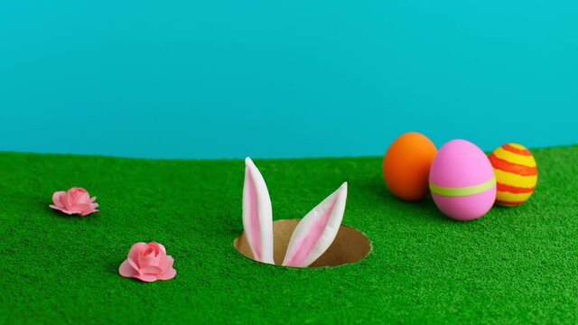 Easter bunny hiding in meadow
