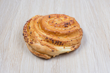 Fresh bakery on light wooden background