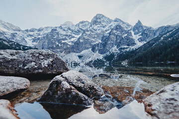 Famous polish mountains Sea Eye Lake (Morskie Oko) in spring. Tatra National Park, Poland © KoralFox